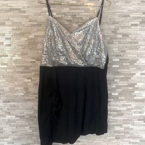 Asymmetrical black and silver sequined dress